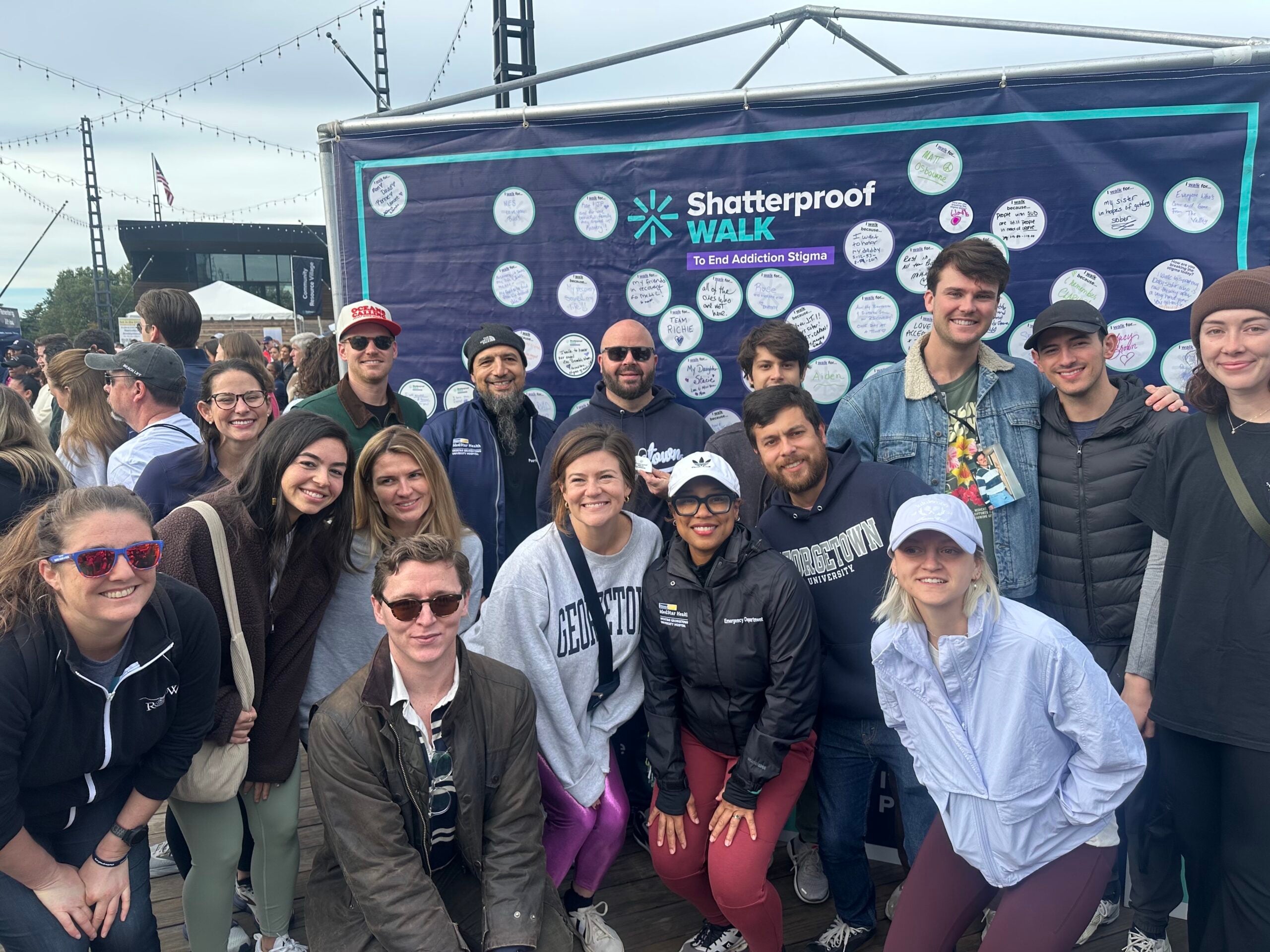 Students, alumni and friends gather for a photo at the 2025 Shatterproof Walk