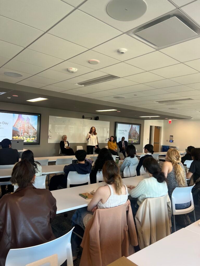 Program Director Regina LaBelle delivers opening remarks to prospective students.